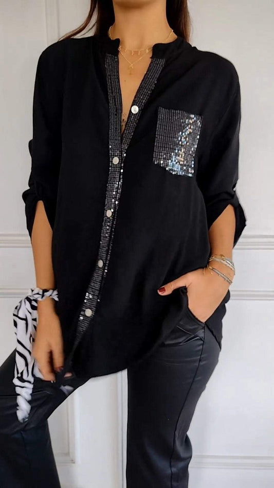 Casual top with V-neck and medium-length sequined sleeves